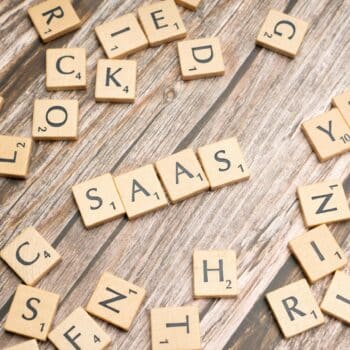 scrabble-letters-spelling-saas-on-a-wooden-tabl